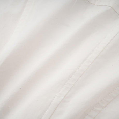 Alt text White pleated mini shirt dress with fitted waist by Orlane