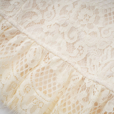 Anaelle off white blouse with bowknot detail and floral lace pattern