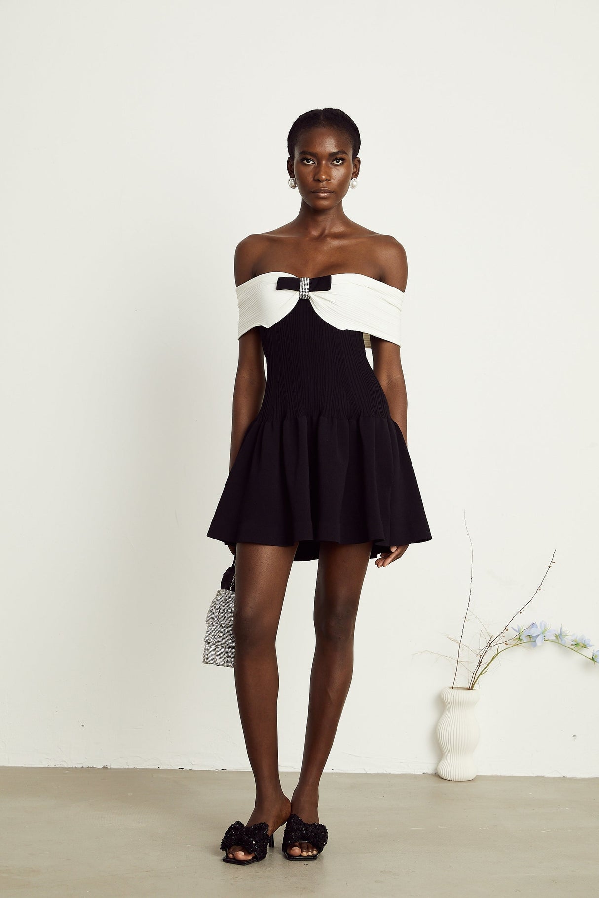 Angèle black offshoulder knitted mini dress