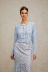 Ariane matching set with blue floral lace top and skirt on white background