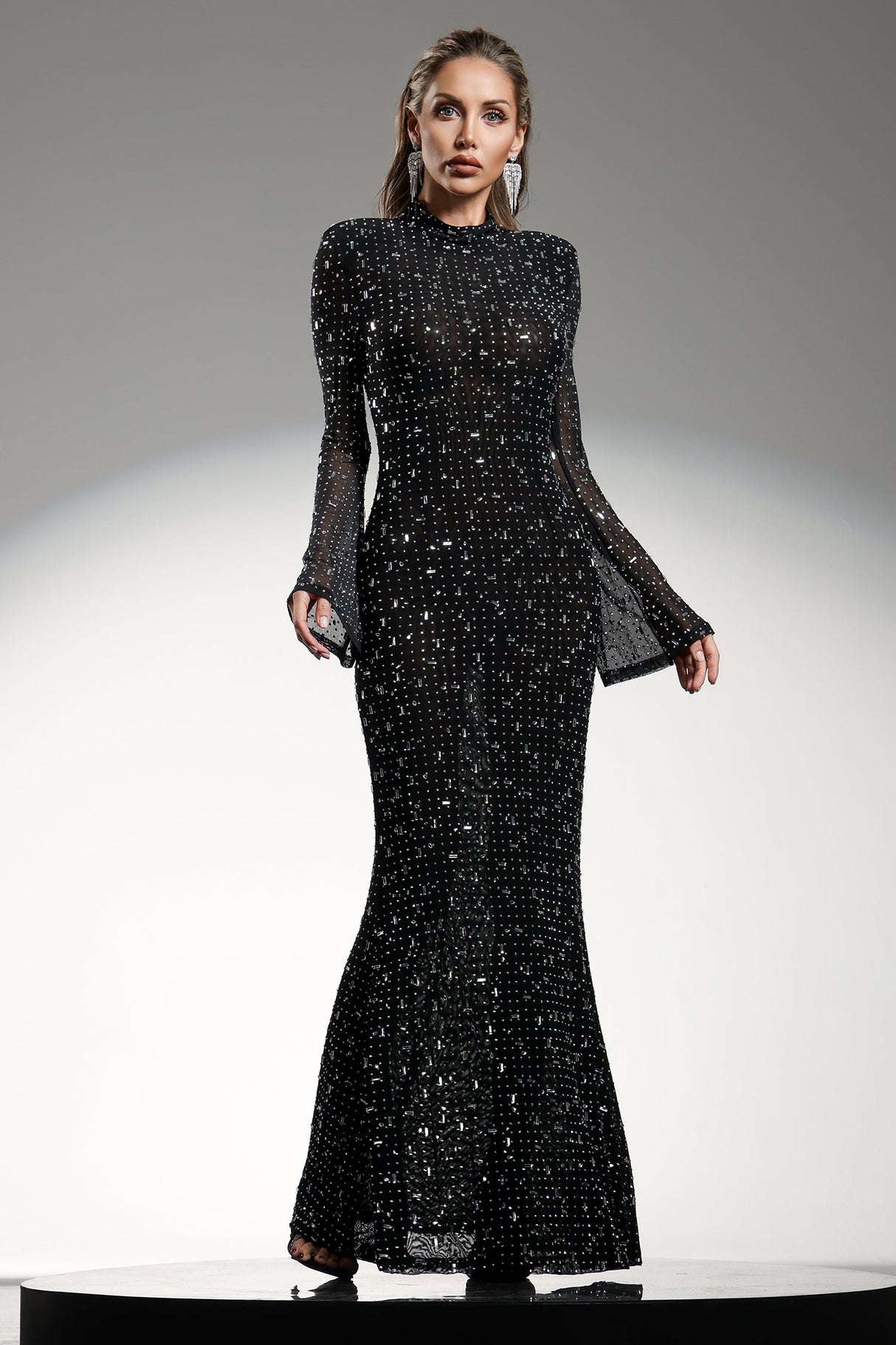 Assunta Black Maxi Dress High Neckline Long Sleeve Diamond Detail Fitted Silhouette Flared Skirt Gala Wedding