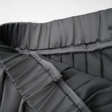 Aubrey Skirt - Color - blocked design - Pleated style - Elastic waistband - Knee length