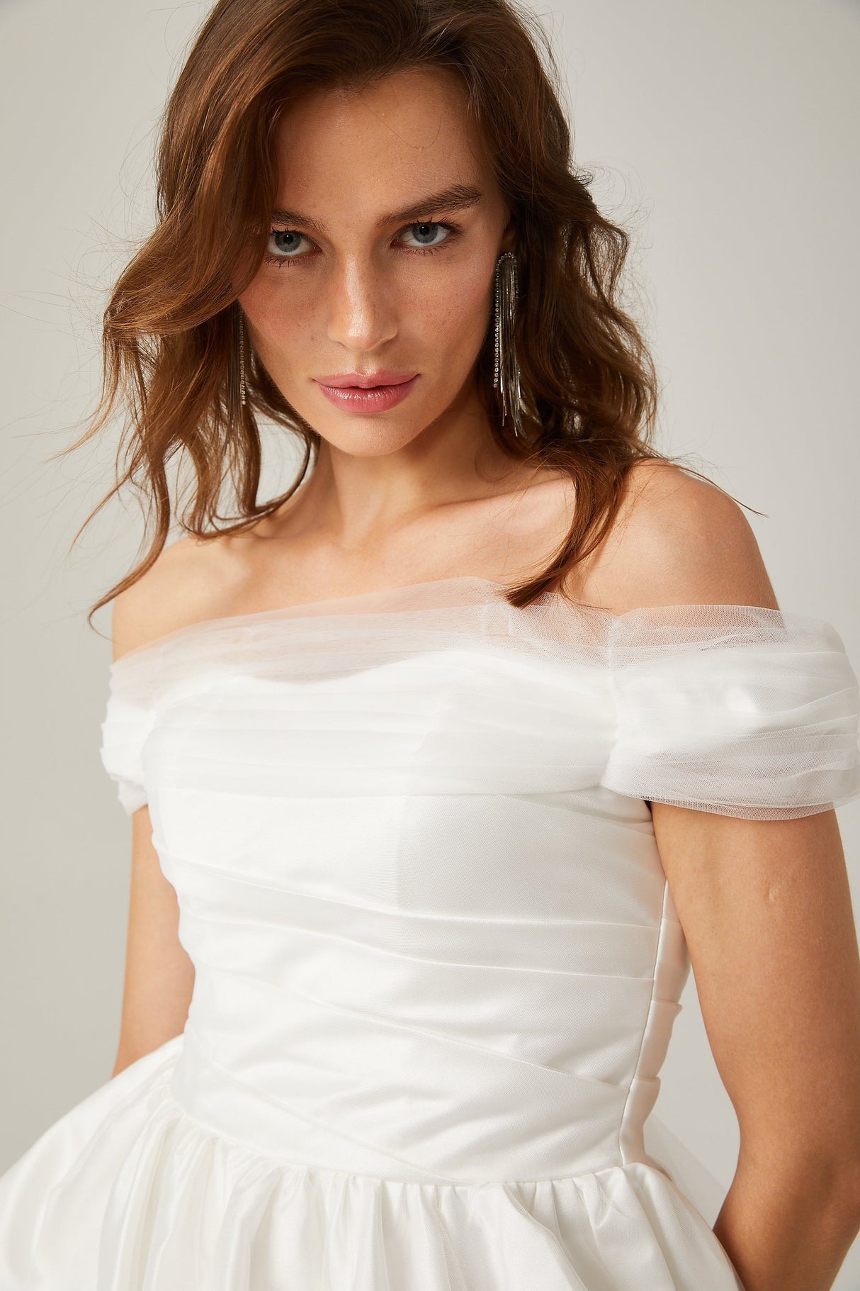 Aurore white offshoulder bowknot mini dress