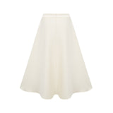 Beige matching set with top and skirt featuring 3D floral petal details in neutral tones