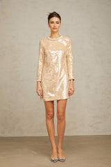 Beige mini dress with faux pearl and sequin embellishments on a mannequin
