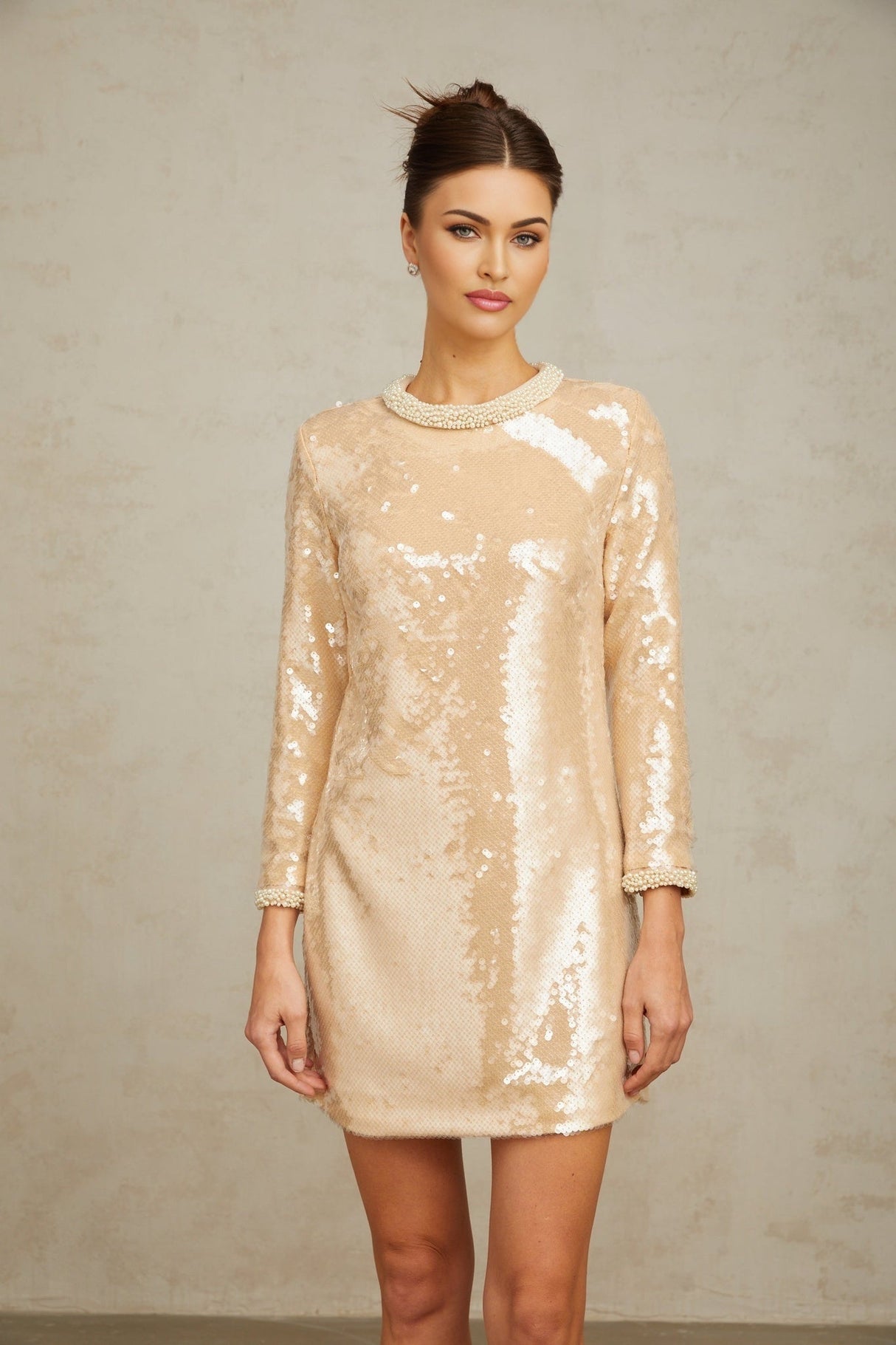 Beige mini dress with faux pearl and sequin embellishments