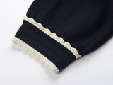 Black A-line silhouette vintage-inspired dress with lace collar