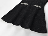 Black A-line structured silhouette with crystal details cocktail dress
