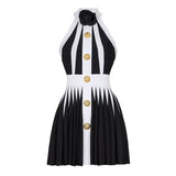 Black and white halter neck A-line dress with gold accents