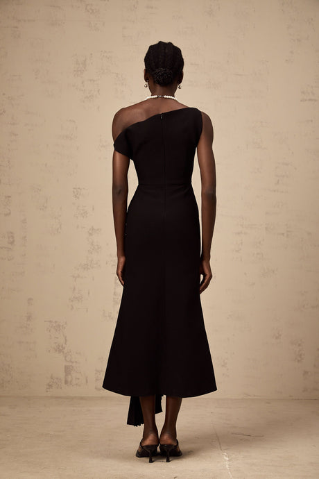 Black asymmetric draped midi dress with a flowing silhouette