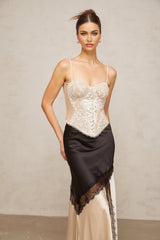 Black bustier top with floral lace panels and sweetheart neckline