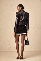 Black faux leather jacket with double breasted design and Diane branding