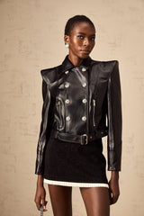 Black faux leather jacket with double breasted design and front pockets