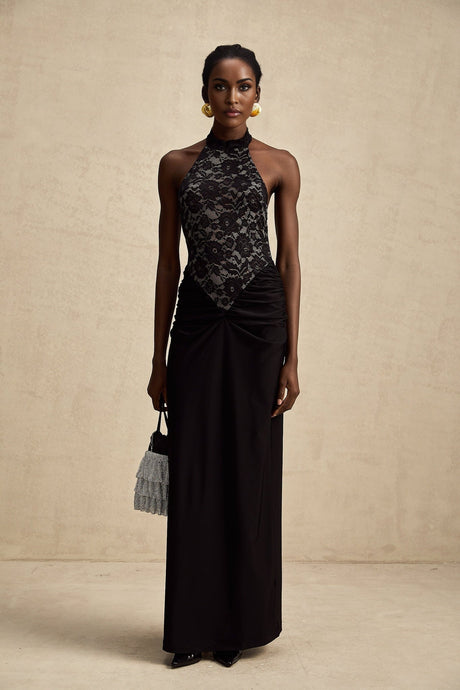 Black floral lace halter neck maxi dress named Camille with a long flowing skirt