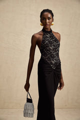 Black floral lace maxi dress with halter neckline and long flowing skirt