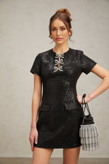 Black glittery mini dress with short sleeves and a fitted silhouette