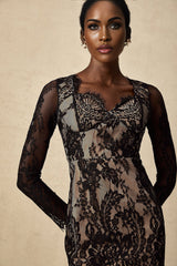 Black mini dress with floral embroidery on lace fabric by Noémie