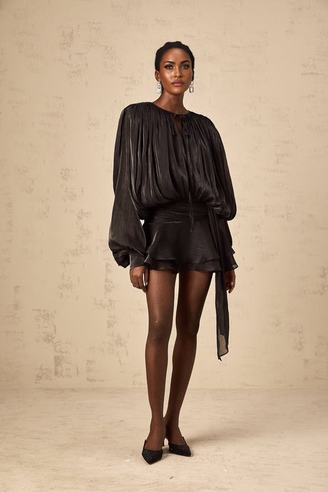 Black mini dress with full pleats and ruffles named Eugenie