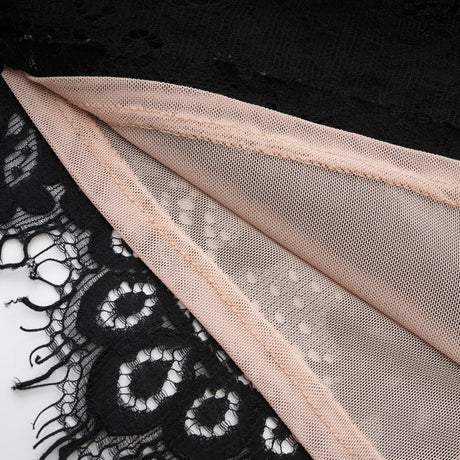 Black mini dress with lace trim called Kylitha