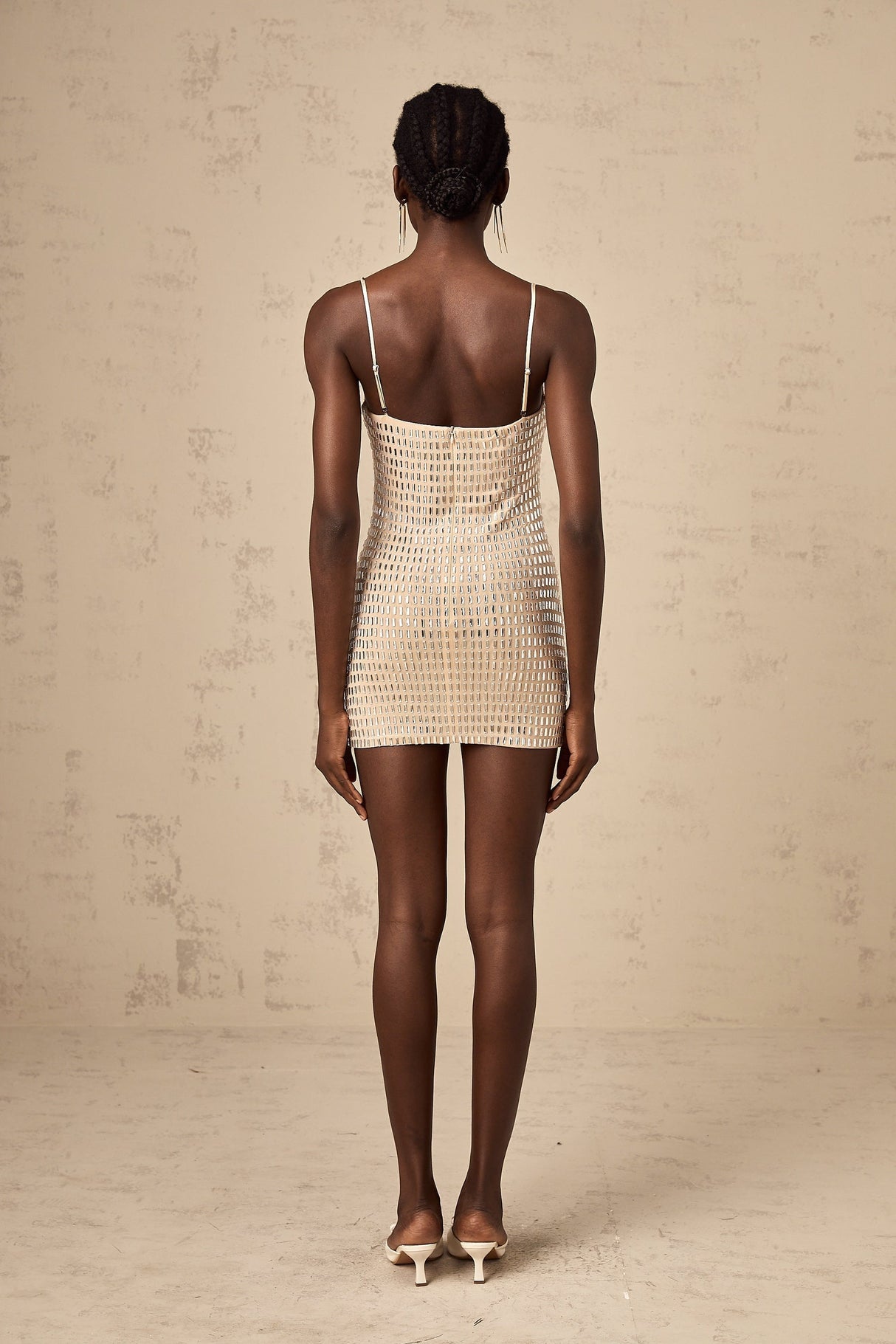 Black mini dress with shiny stud embellishments and short sleeves