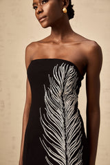 Black off shoulder mini dress with feather embellishments