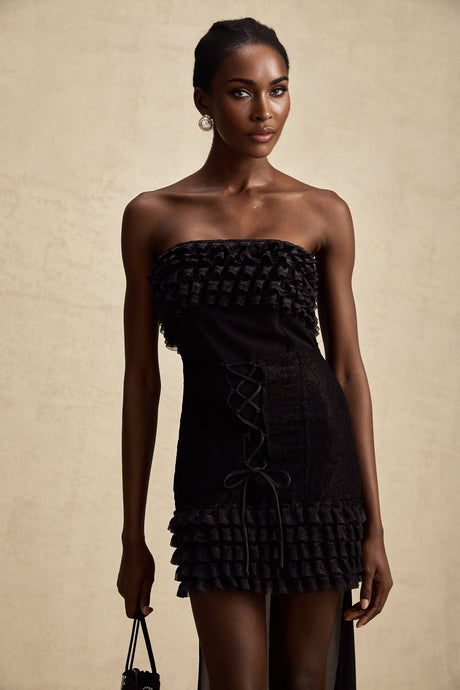 Black ruched mini dress with train named Michele