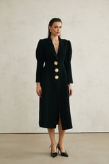Black single breasted long coat by Aelle