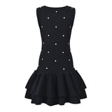 Black sleeveless dress with pearl embellishments and ruffle hem