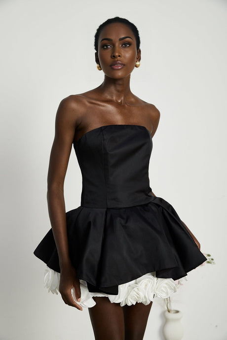 Black strapless corset mini dress with floral petal details named Lucie
