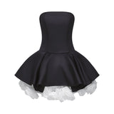 Black strapless corset mini dress with floral petal details named Lucie