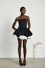 Black strapless corset mini dress with floral petal details named Lucie