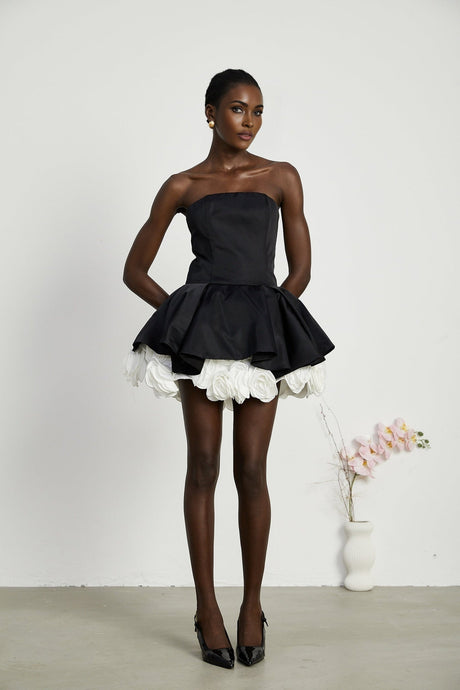 Black strapless corset mini dress with floral petal details named Lucie