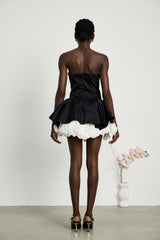 Black strapless corset mini dress with petal details called Lucie