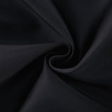 Black strapless mini dress with corset style and floral petal details named Lucie