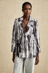 Black textured jacket with graffiti print design called Elise