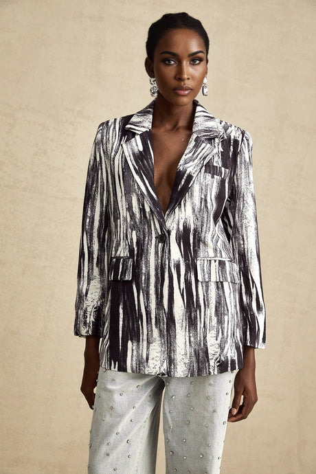 Black textured jacket with graffiti print design called Elise