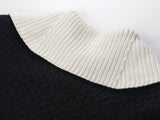 Sophia black ribbed knitted jacket with white accents and gold buttons paired with a matching bodycon skirt