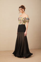Blue cropped top with allover white floral print and short puffed sleeves
