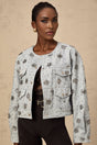 Blue denim jacket with studded sun design and Katell branding