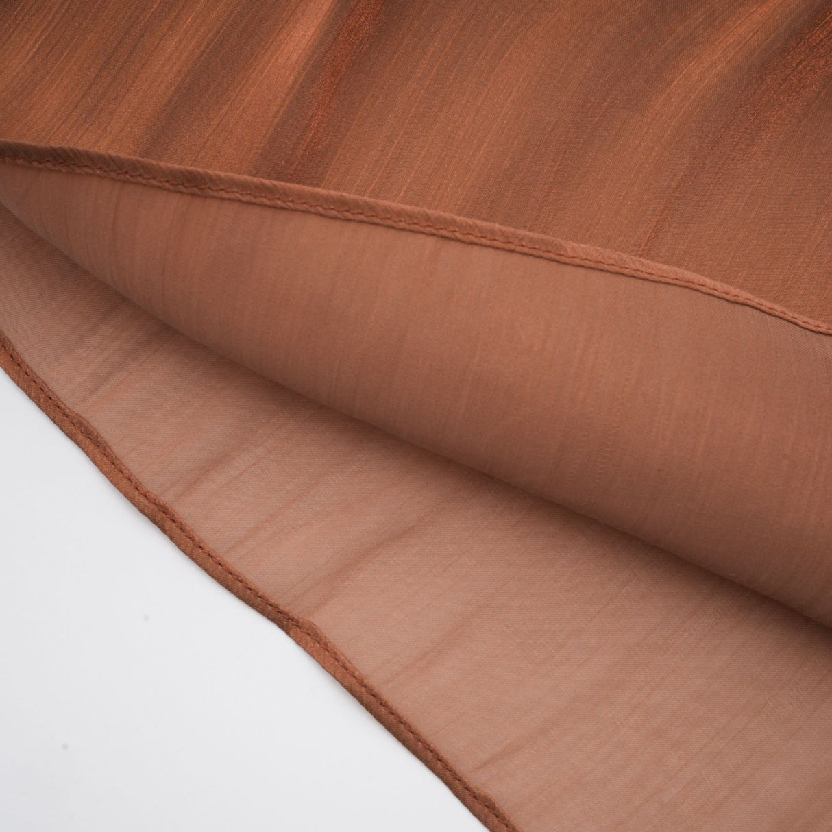 Brown pleated satin maxi dress with long flowing skirt and elegant design