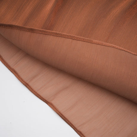 Brown pleated satin maxi dress with long flowing skirt and elegant design
