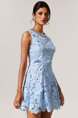 Bruna Blue Lace Dress with Shimmering Embellishments and Floral Patterns for Weddings and Garden Parties