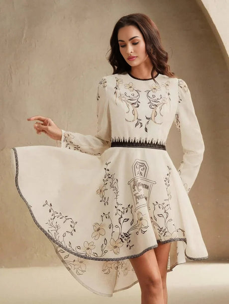 Elevate your wardrobe with this elegant ivory dress featuring intricate floral embroidery and a playful high-low hemline..
