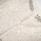Brynn Mini Dress - Sleeveless with Sequin Detailing - Cut - Out Design - Crystal Embellishments - Bow Accent