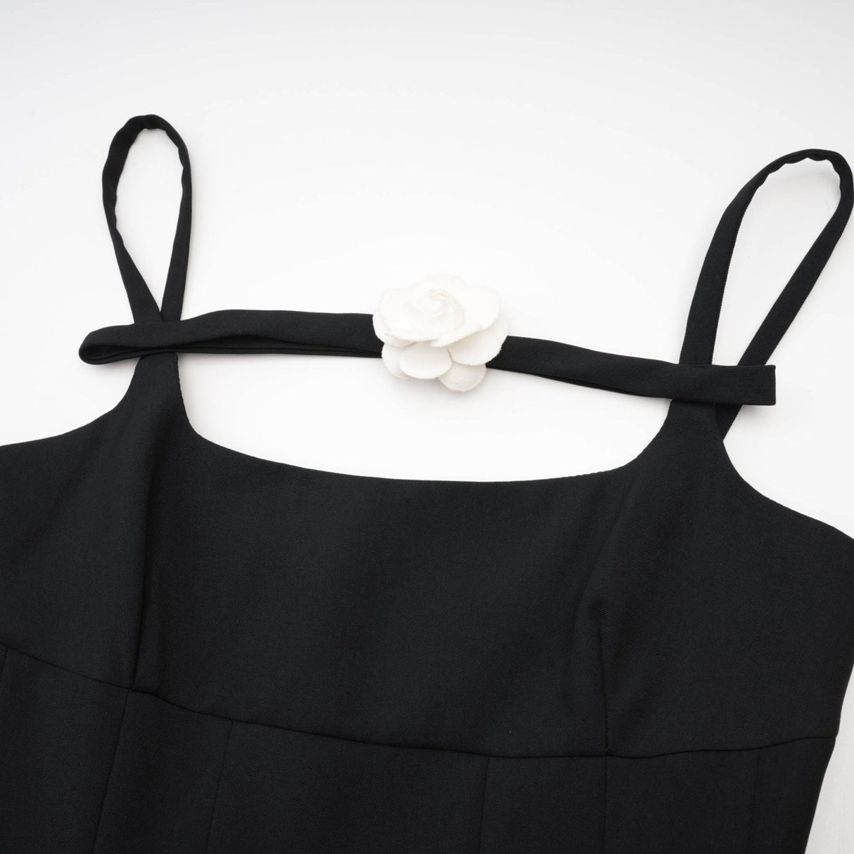 Camellia pleated black mini dress