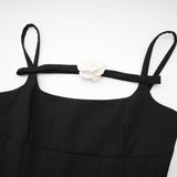 Camellia pleated black mini dress
