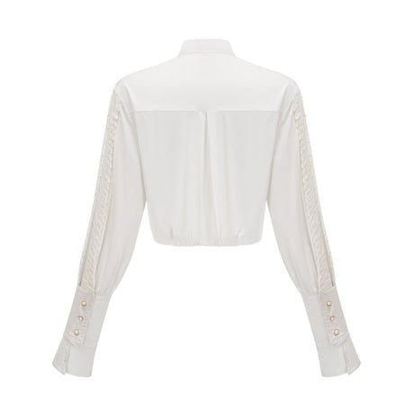 Céleste white pleated scarfcollar shirt