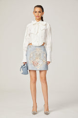Céleste white pleated scarfcollar shirt
