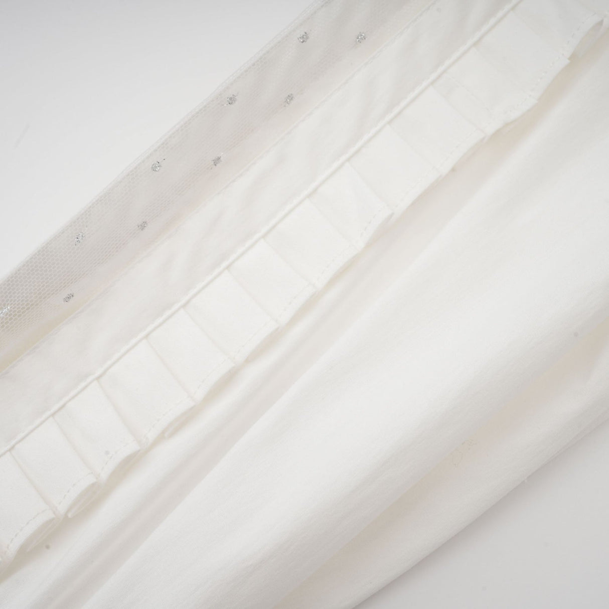 Céleste white pleated scarfcollar shirt