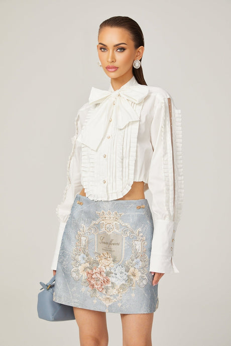 Céleste white pleated scarfcollar shirt